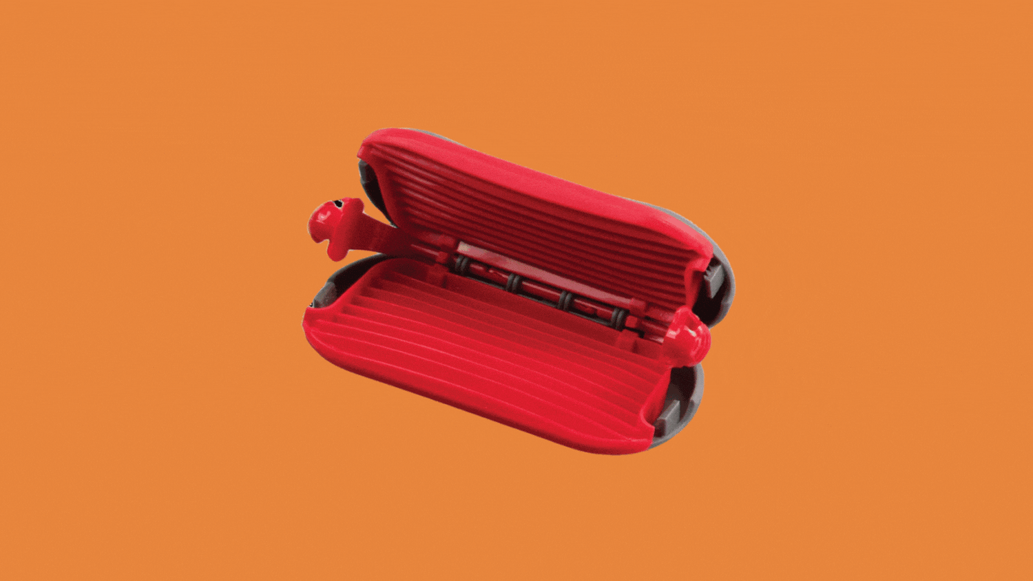 GIF comparing Pebblegrip to a hair clip.