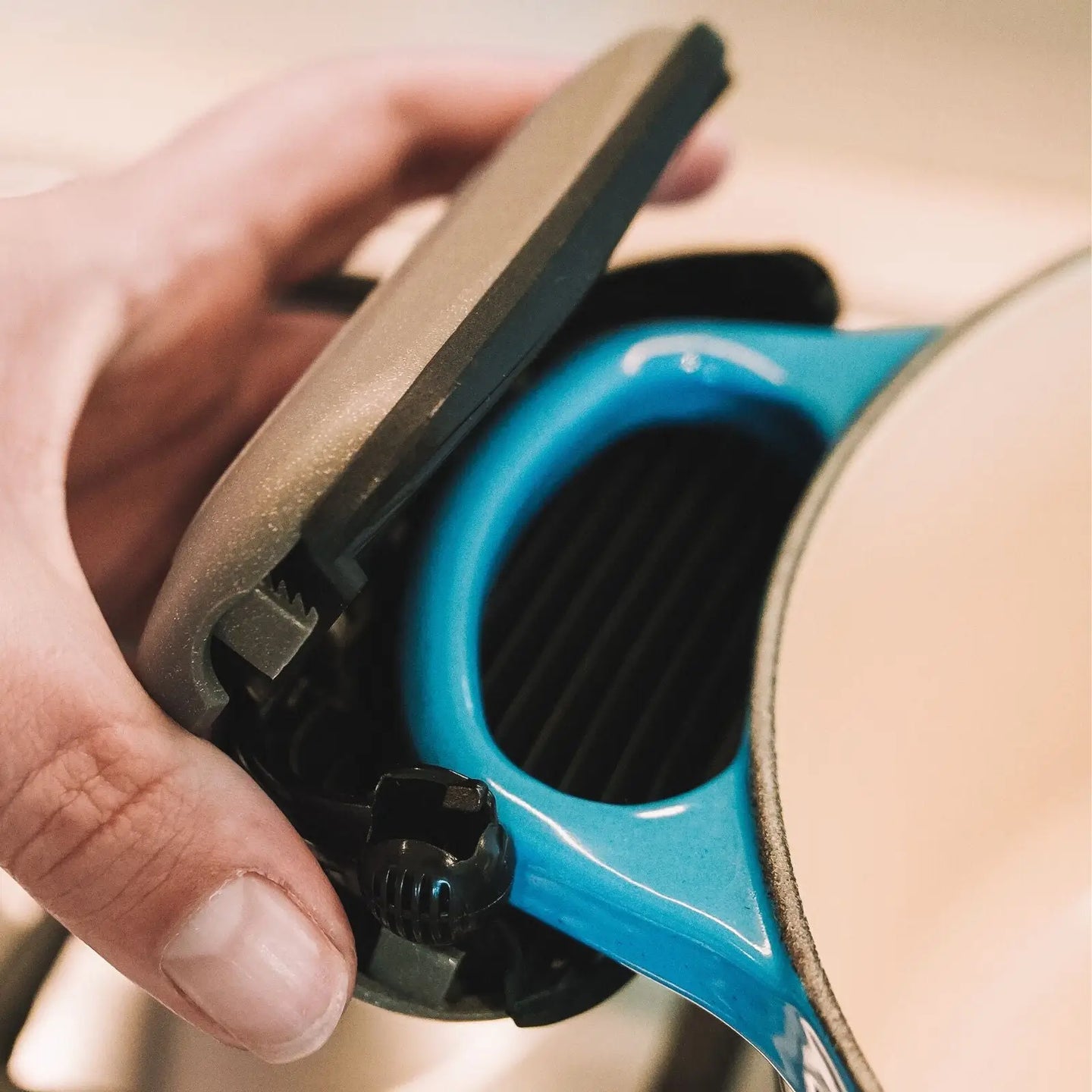 Pebblegrip showing placement over cast iron, le creuset cookware handle